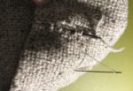 darning to reweave a new thread into a hole in the cloth