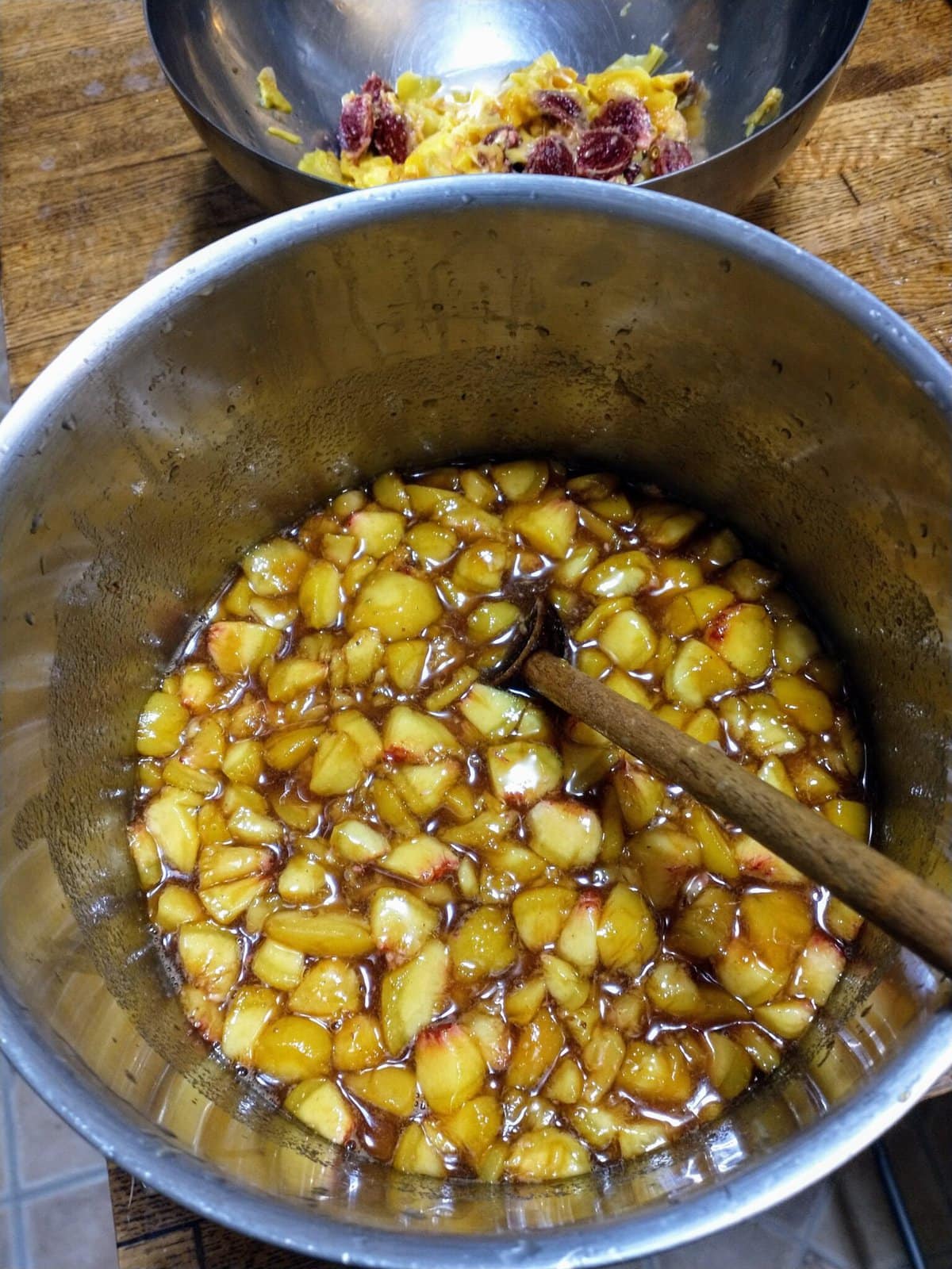 a pot of diced skinned peaches ready to cook down into compote.