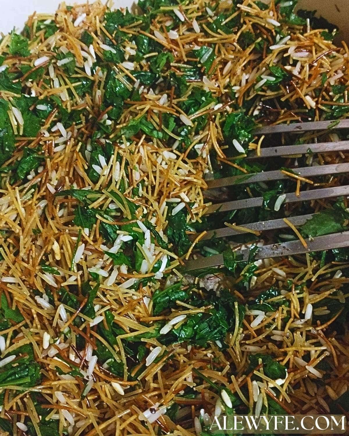 folding in the other ingredients and stirring until the greens wilt slightly