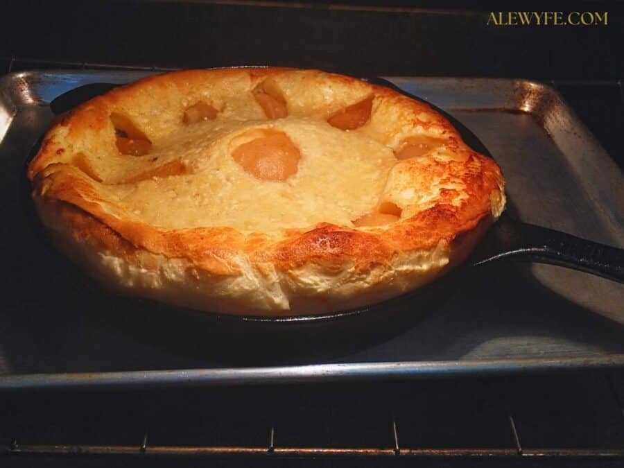 baked pear dutch baby pancake in the oven