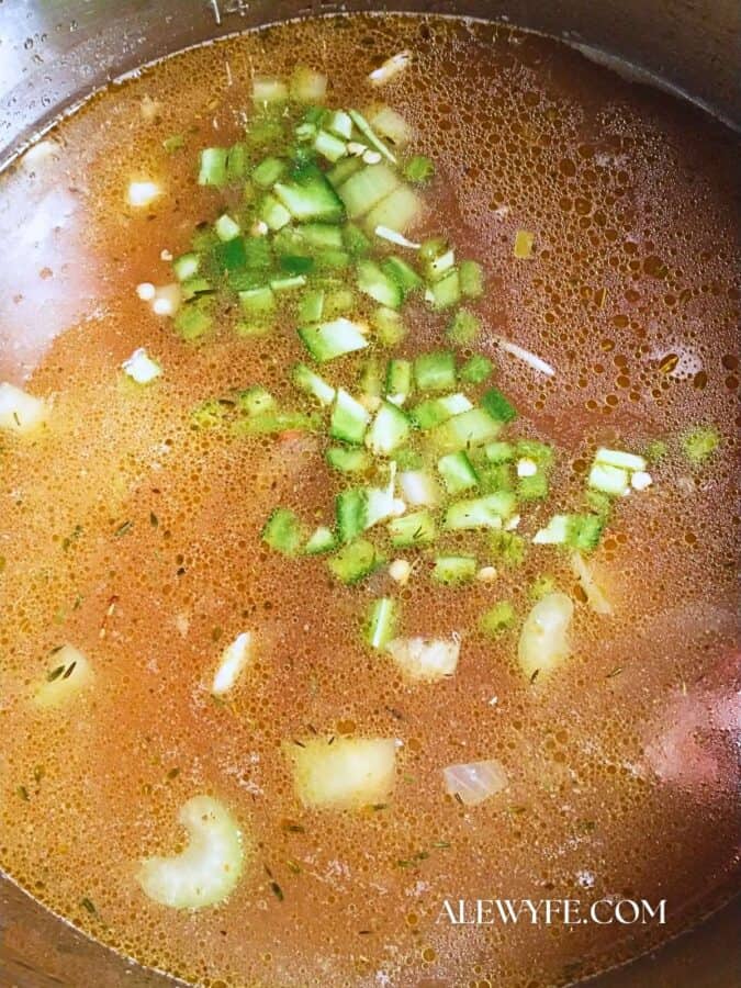 the soup after adding the broth and jalapeno peppers, but before pressure cooking