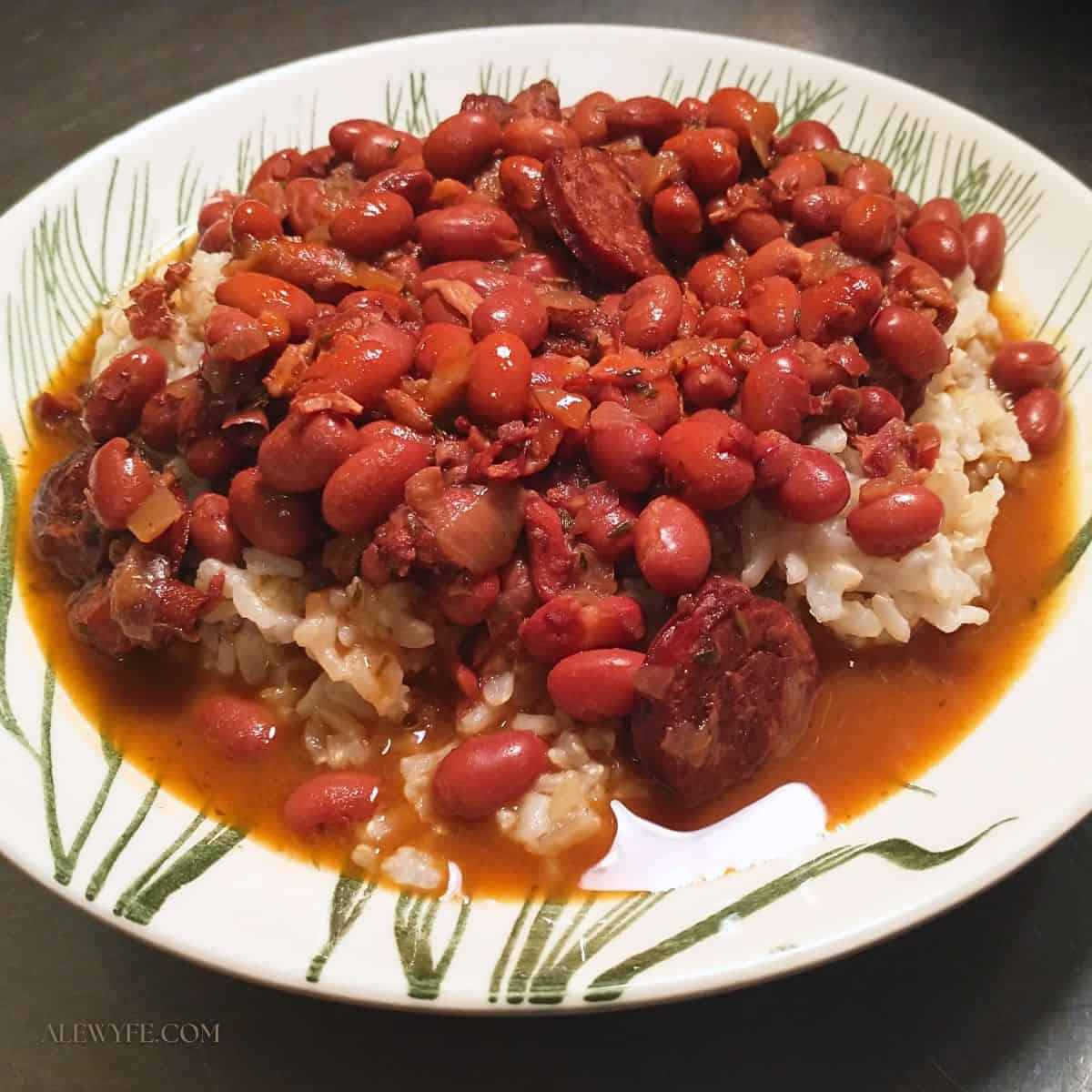 a bowl of Cajun red beans and sausage over baked brown rice.