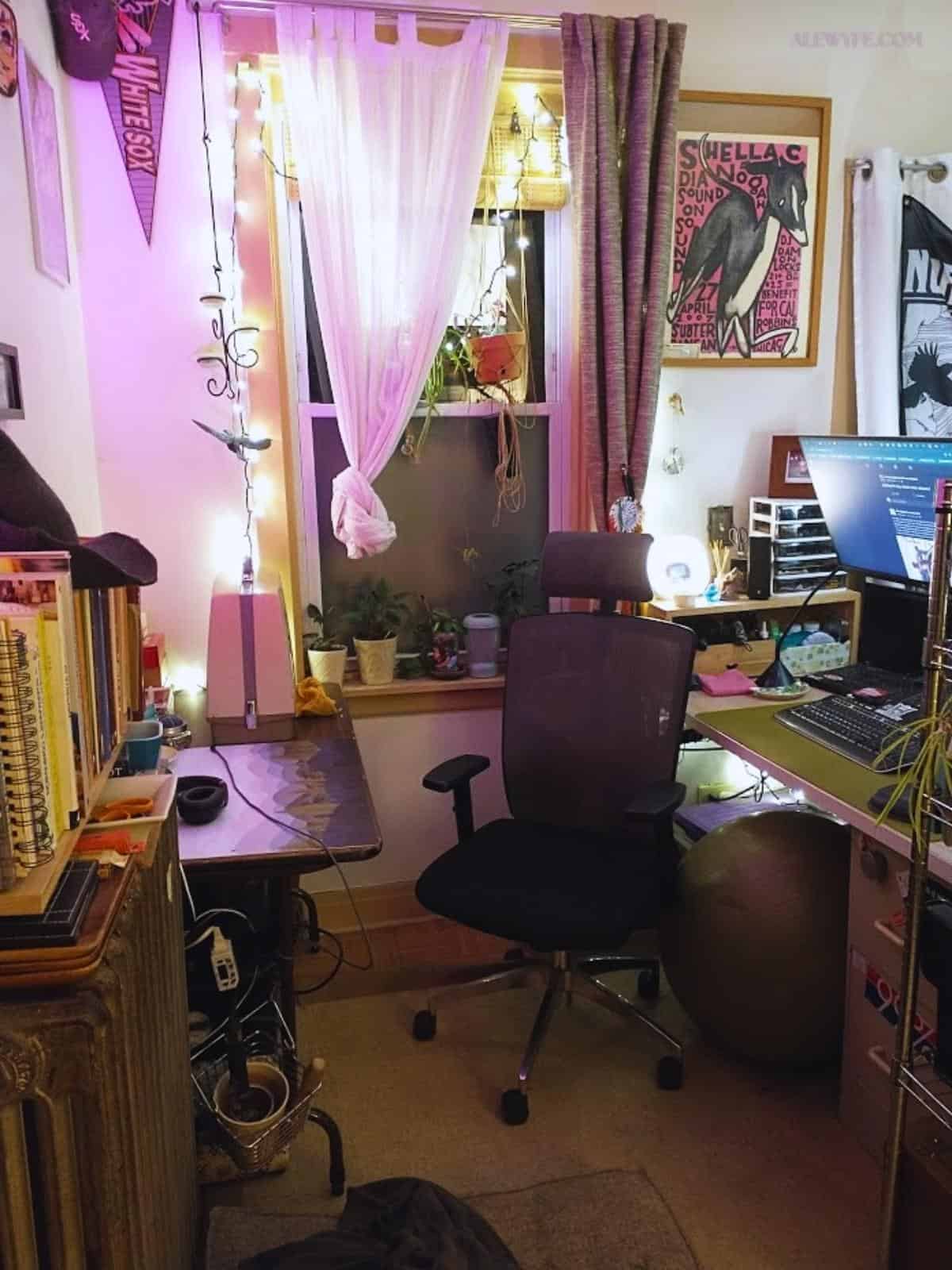 A view from the bedroom door at the rearranged desk and sewing table workspace. 