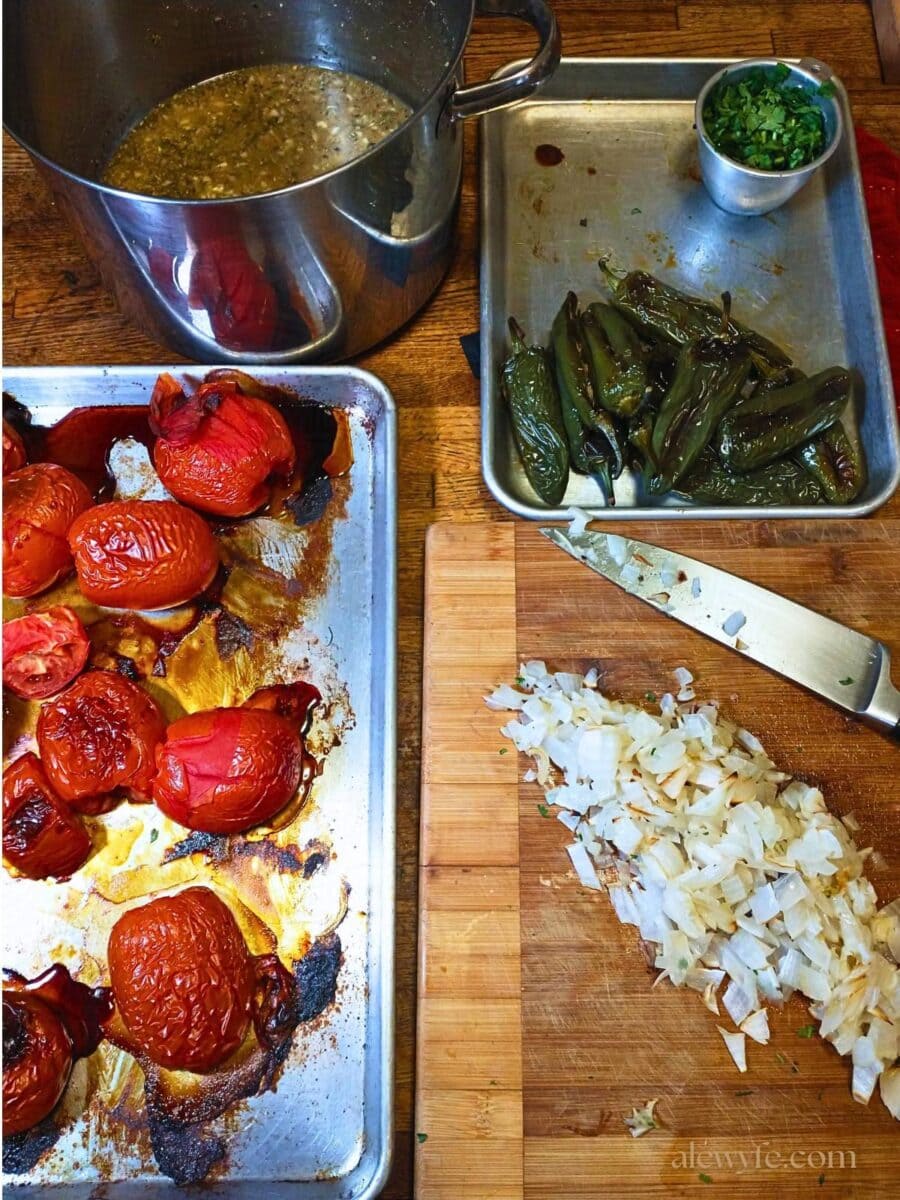peeling and chopping the roasted veggies for the salsa.