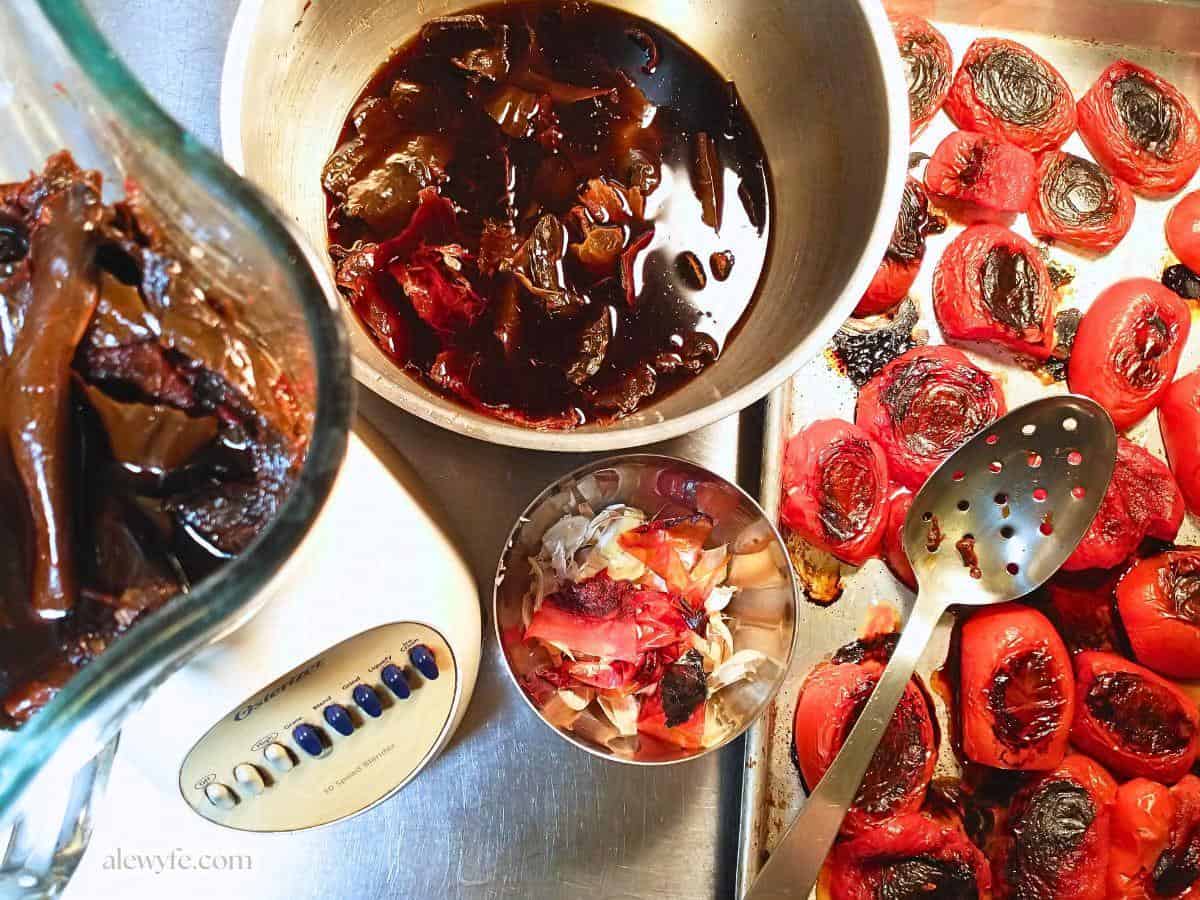 blending roasted tomatoes and soaked chile peppers for salsa.