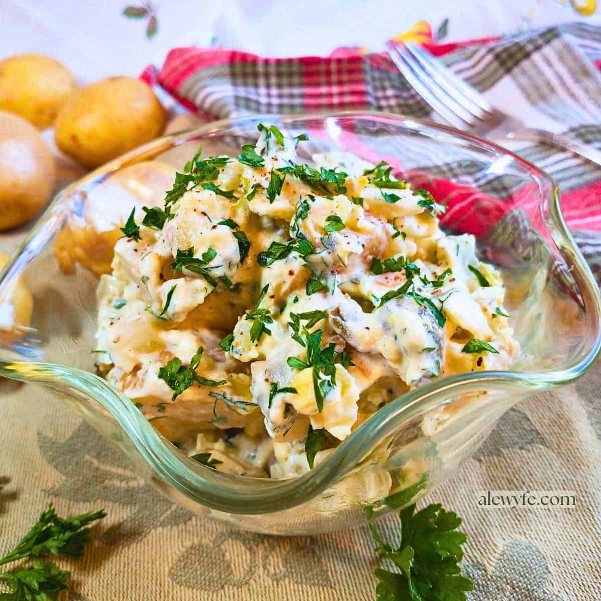 a bowl of dill yogurt potato salad.