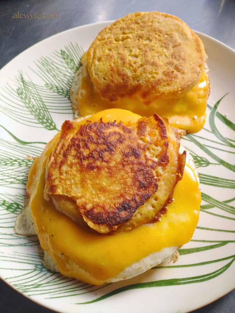 egg and cheddar sandwiches on split pumpkin crumpets.