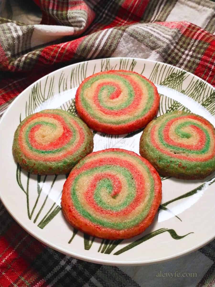 Christmas pinwheel cookies on a plate.