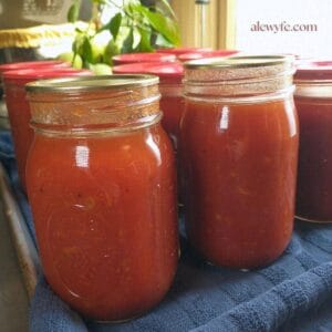 close-up photo of jars of homemade bloody mary mix.