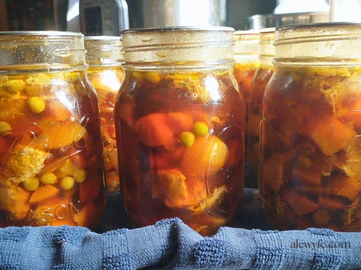 side shot of pint jars of chicken mushroom stew or pot pie filling.